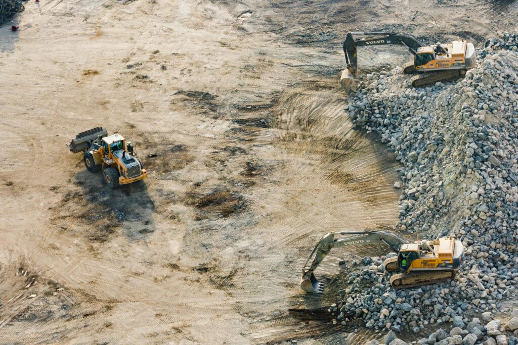 pexels-photo-1238864-1238864 Aerial shot of heavy machinery working on a construction site in Dubai.